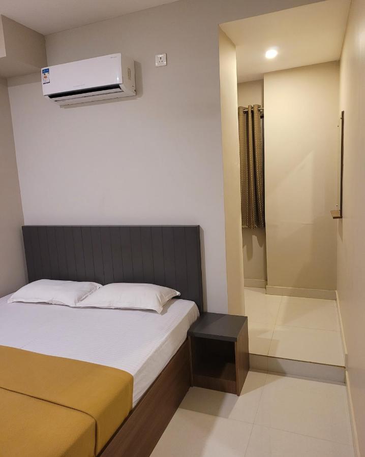 M Square Hotel Vellore Quarto foto