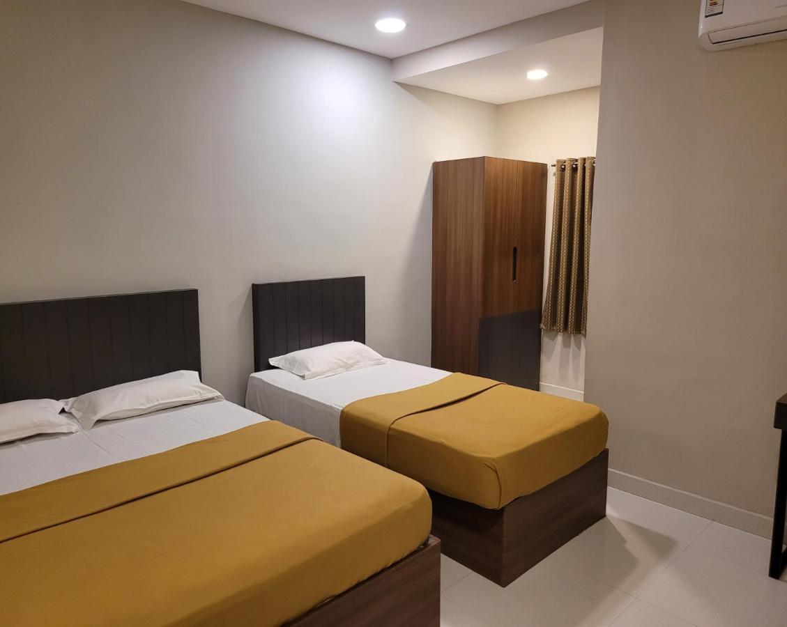 M Square Hotel Vellore Quarto foto