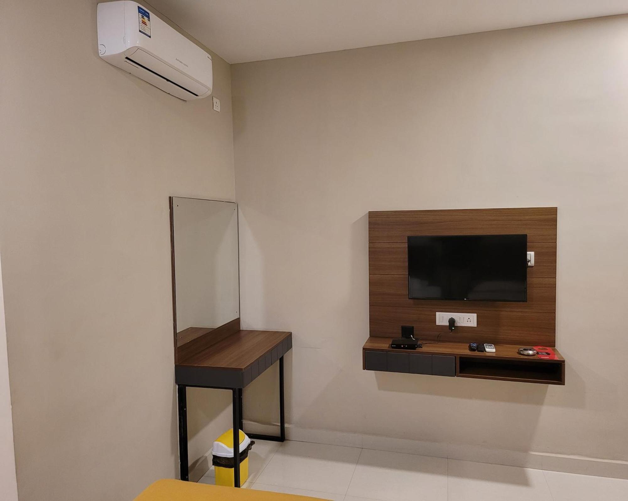 M Square Hotel Vellore Quarto foto
